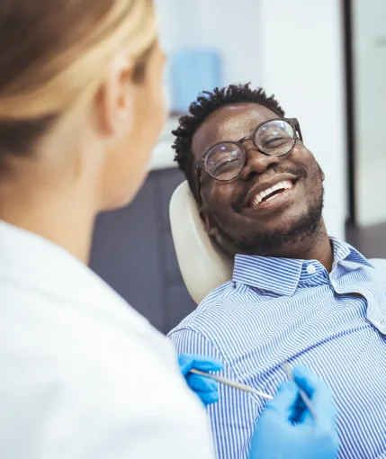 Patient smiling during dental visit